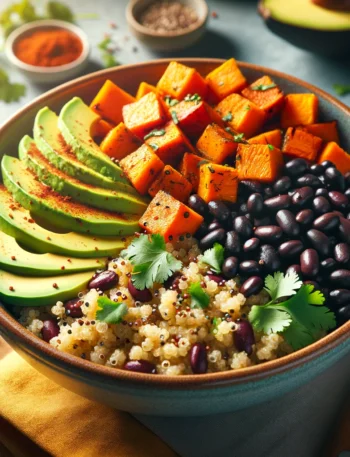 Colorful Spicy Sweet Potato & Black Bean Quinoa Bowl with avocado and cilantro